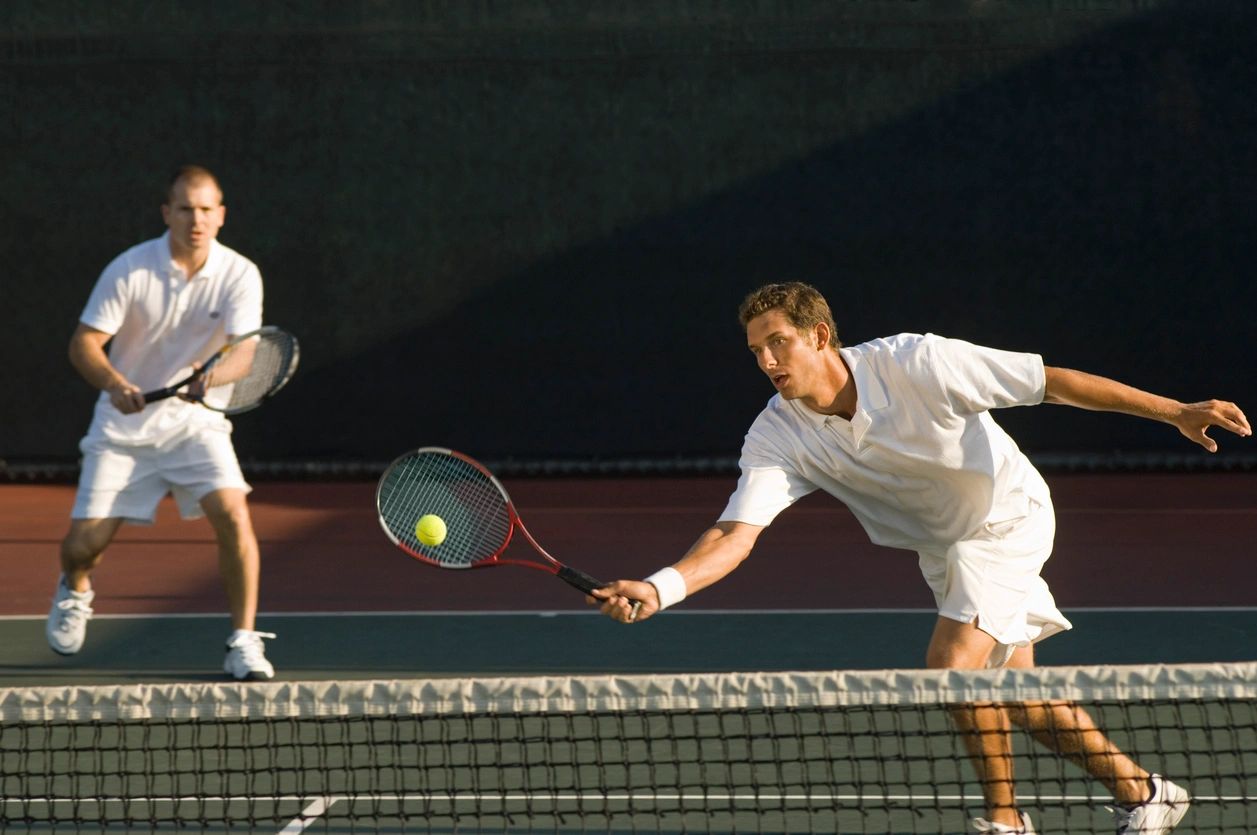 Doubles match with focused players